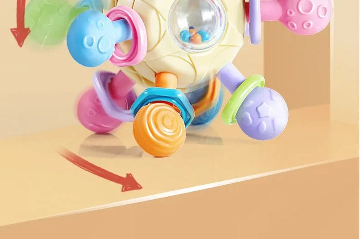 Rotating Rattle Ball – Silicone grasping toy for 0-12 months, aids baby development and sensory play.